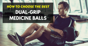 man doing sit ups with double handle medicine ball