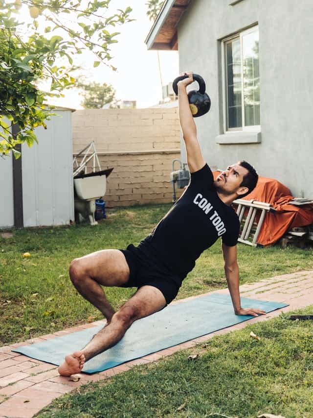 a man doing turkish get up